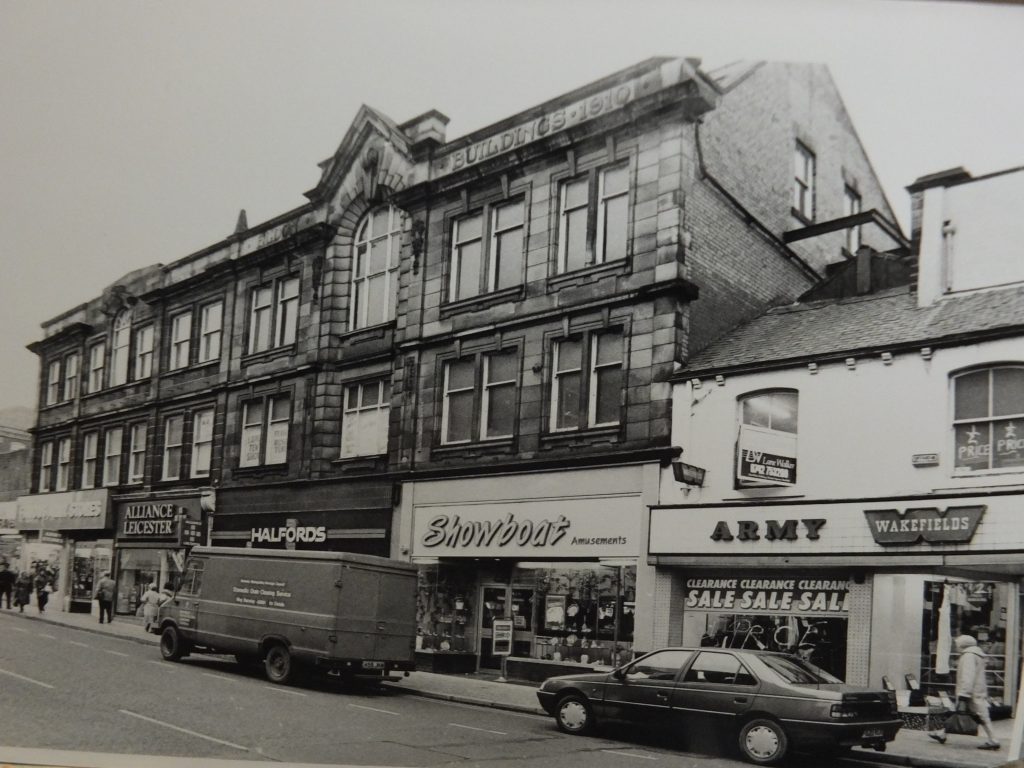 • A black and white photograph if the former YMCA Building and the Eldon Buildings, 12 – 26 Eldon Street. 1988. @Barnsley Archives