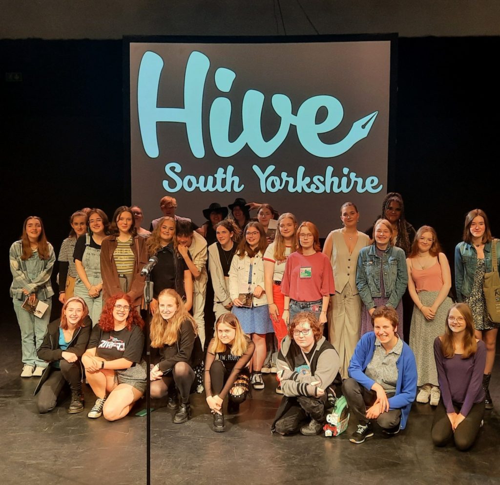 A group of young people stand of stage together at Barnsley Civic.
