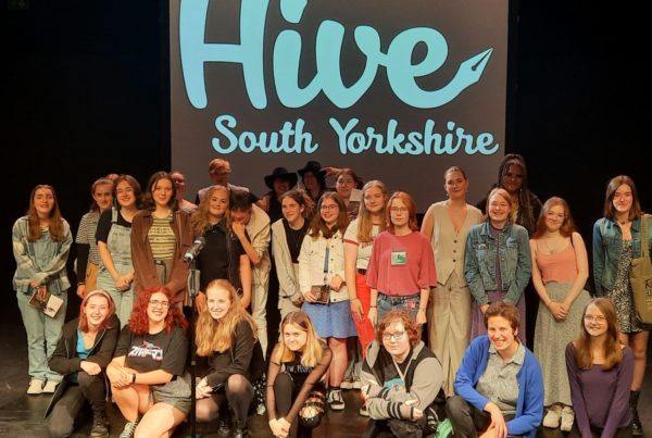 A group of young people stand of stage together at Barnsley Civic.